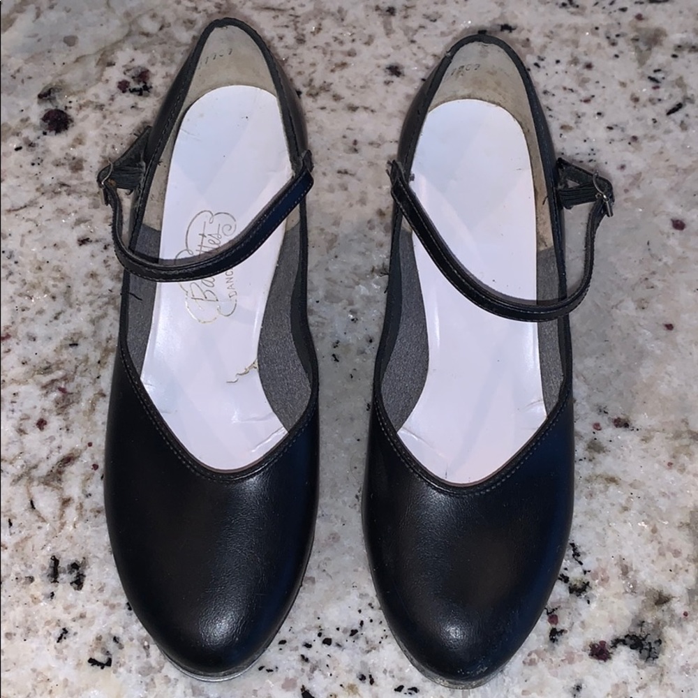 Tap Shoes. Run small. Would fit 7.5 or 8 better.